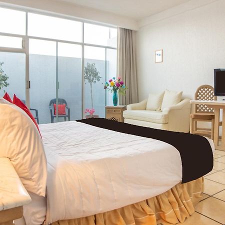 Capital O Hotel Villa Monini ปวยบลา ภายนอก รูปภาพ