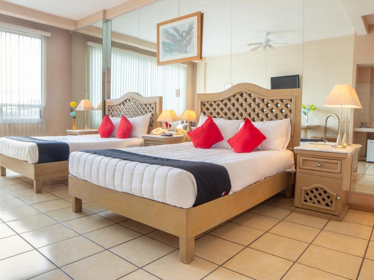 Capital O Hotel Villa Monini ปวยบลา ภายนอก รูปภาพ