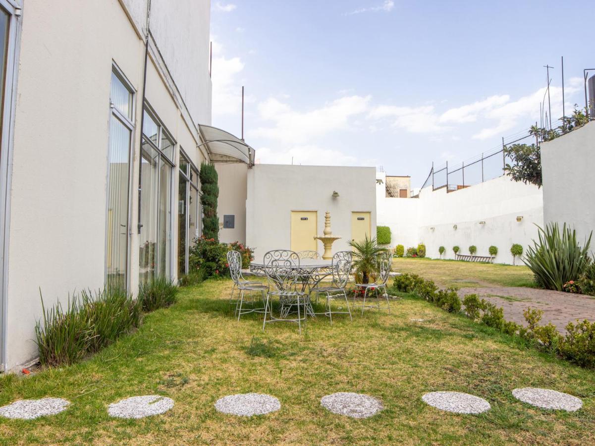 Capital O Hotel Villa Monini ปวยบลา ภายนอก รูปภาพ
